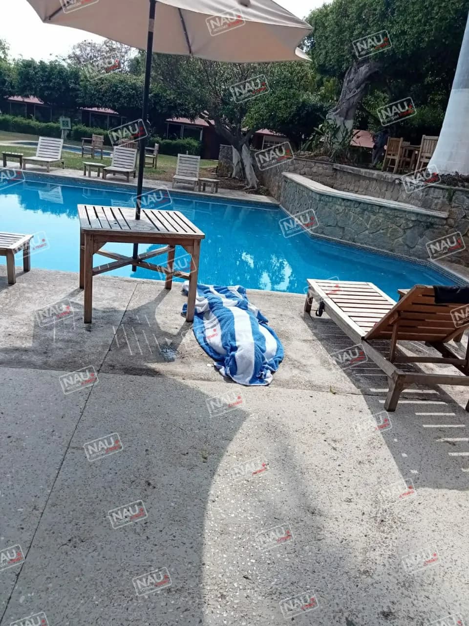 Muere mujer la caer a una alberca en conocido hotel.