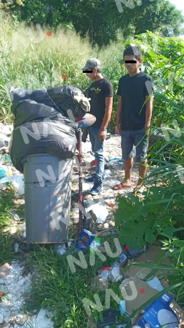 Guatemalteco y Salvadoreño detenidos por tirar basura en la vía pública