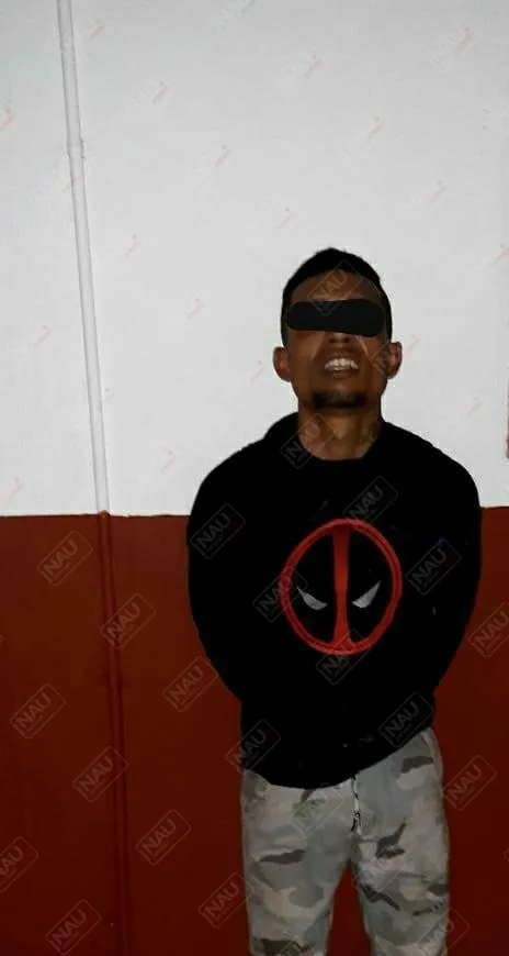Pareja de centroamericanos detenidos por asaltar a una señora