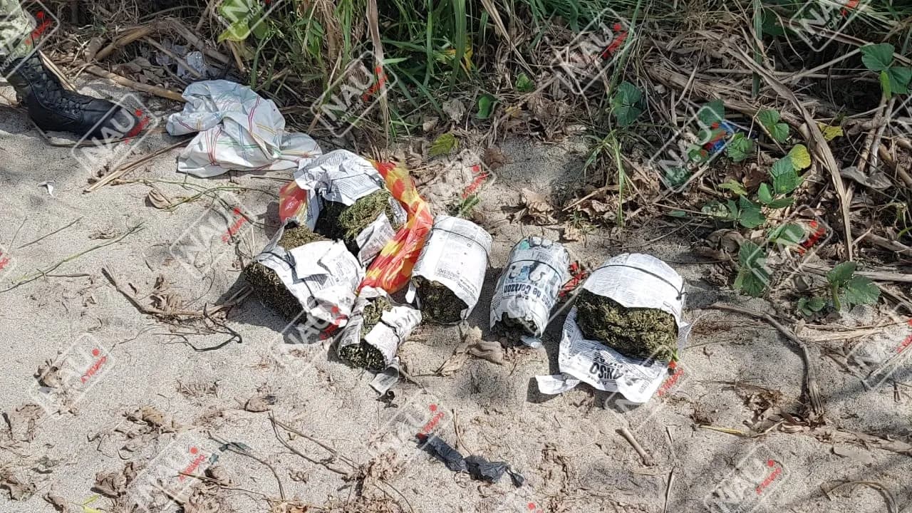 En la rivera del rio Suchiate dos sujetos abandonan 2 kg de marihuana