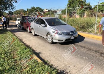 Tres vehículos con daños