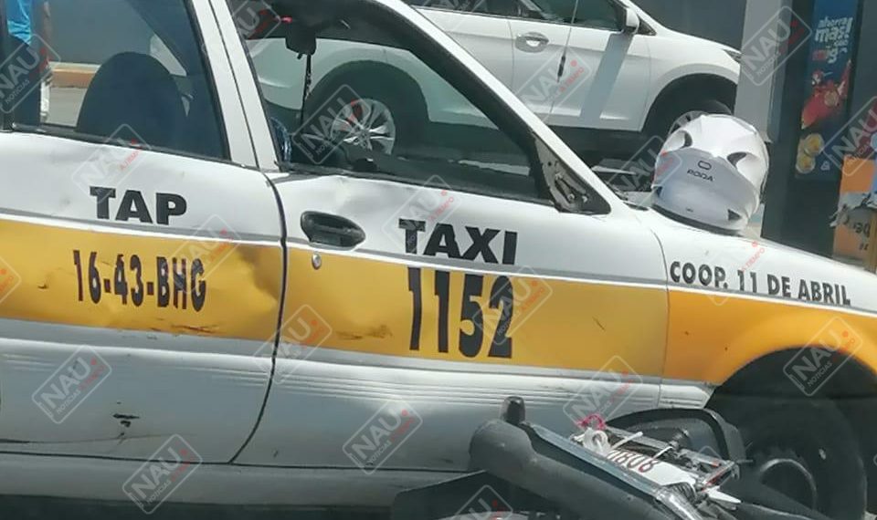 Motociclista lesionado al ser impactado por un taxista