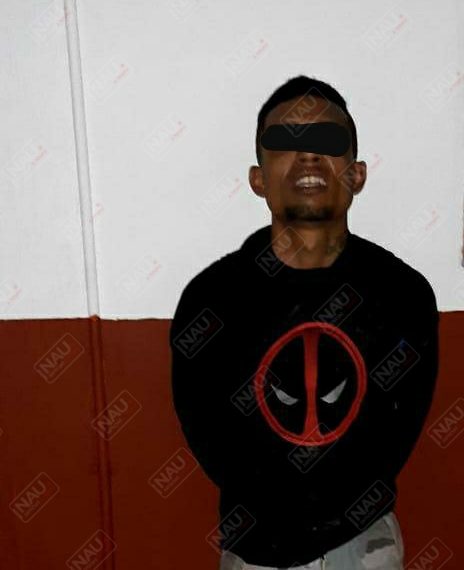 Pareja de centroamericanos detenidos por asaltar a una señora