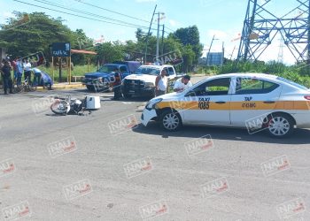 Motociclista arrollado por un taxi
