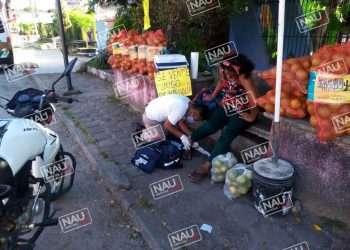 Señora lesionada al derrapar en su motocicleta.