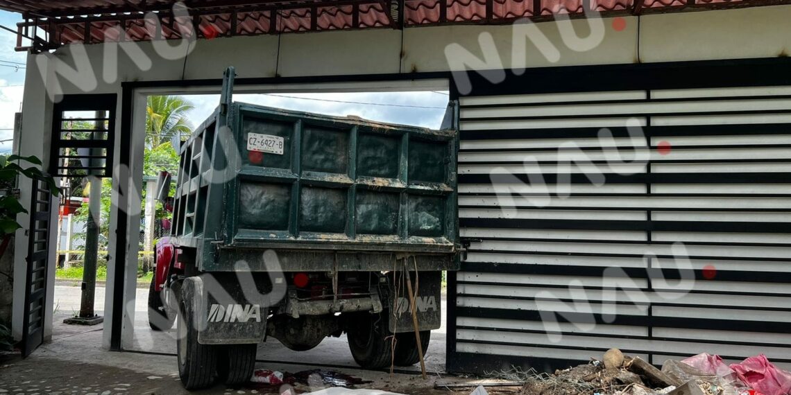 Un muerto y un herido al caer una tapa de un camión de volteo