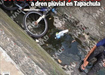 Joven cae con todo y bicicleta a dren pluvial en Tapachula
